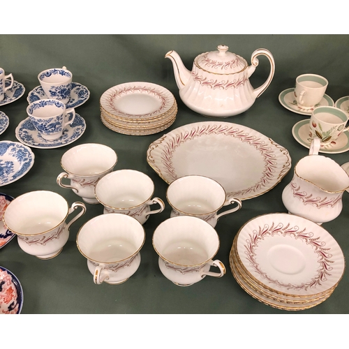 2040 - A Paragon Harmony part service, 1 teapot, 1 jug, 1 cake plate, 6 side plates, 6 cups and saucers and... 