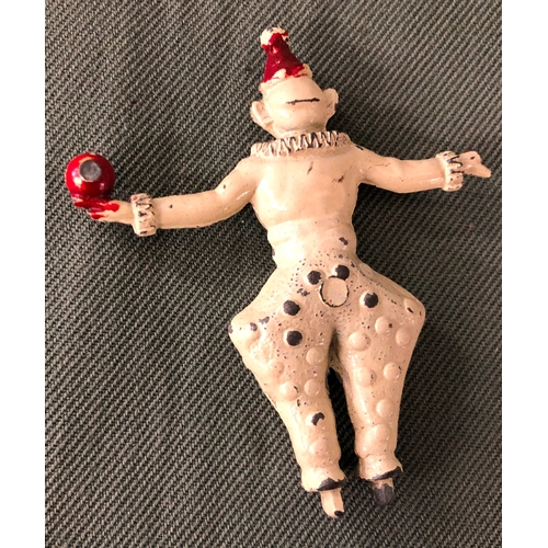 2046 - A small lead figure of a clown and a quantity of similar plastic performing clown figures etc.