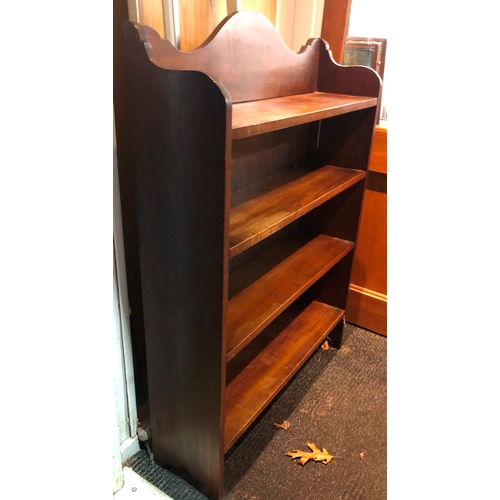 2061 - A freestanding bookcase, 92cm wide, 26cm deep, 48cm high. This Lot is held in storage, please call p... 