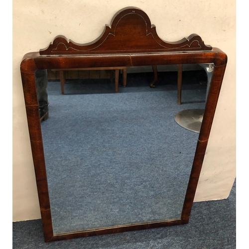 2062 - A mahogany framed wall mirror, 50.5cm wide, 76cm long overall.