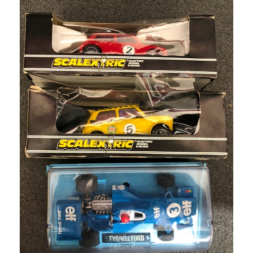 2065 - A Scalextric Tyrell Ford, boxed, a Scalextric yellow Mini 1275 G, and a red a Scalextric Mini 1275 G... 