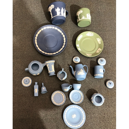 2067 - A quantity of various blue and green miniature Wedgwood pieces, including a tea set.