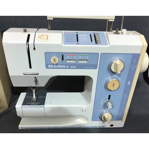 2081 - A good quality Bernina sewing machine, model 1030, numbered 2810899E, in hard case and with foot ped... 