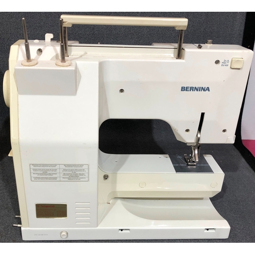 2081 - A good quality Bernina sewing machine, model 1030, numbered 2810899E, in hard case and with foot ped... 