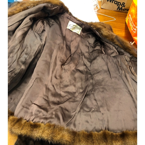 2083 - A chestnut brown short fur coat labelled Theodore Roach Melton Court 15 Old Brompton Road London S.W... 