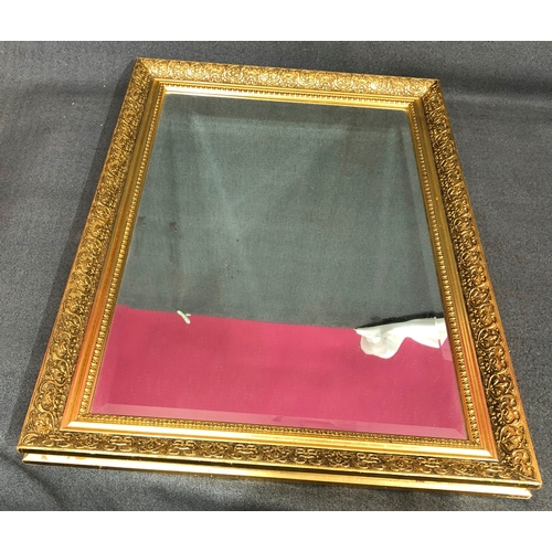 2108 - A rectangular mirror, 65 x 41.5cm in gilt frame.