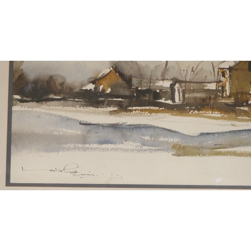 218 - Leslie Goodwin, watercolour depicting buildings on riverbank, signed, framed 32cm x 47cm