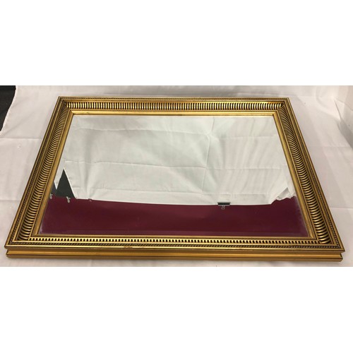 2282 - A gilt framed mirror, 60.5 x 80.5cm.