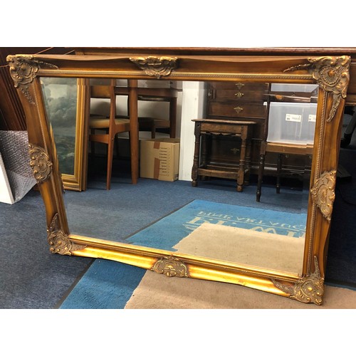 2288 - A large mirror in gilt frame, 104.5 x 75.5cm.