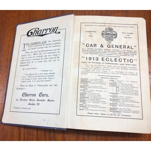 2337 - A Royal Automobile Club Year Book 1913 and 2 pairs of opera glasses, (larger pair dented to rims and... 