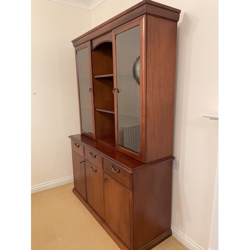 2341 - A large dresser with 3 cupboard doors, 3 drawers, 2 upper glass display cupboards with mirrored back... 