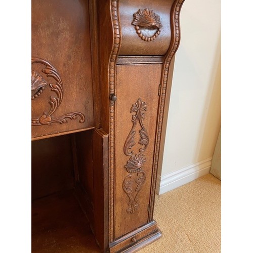 2339 - A small desk/sewing table with carved detail to drawers and door fronts, interior drawer compartment... 