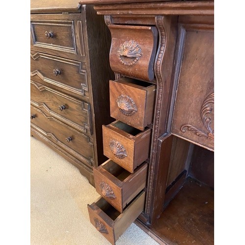 2339 - A small desk/sewing table with carved detail to drawers and door fronts, interior drawer compartment... 