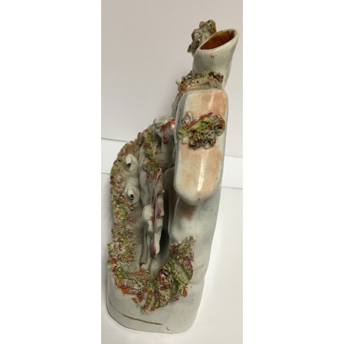 2325 - A 19th Century Staffordshire spill vase in the form of figures outside watermill, 12cm high.