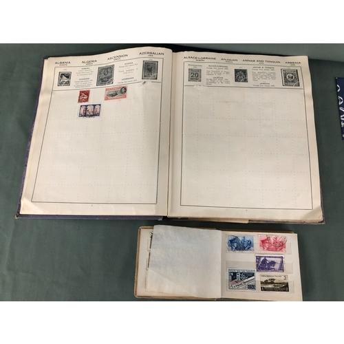 2100 - 2 stamps albums containing a collection of worldwide stamps and various First Day Covers.