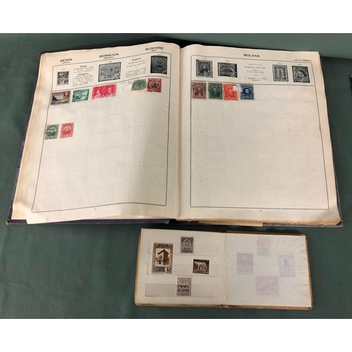 2100 - 2 stamps albums containing a collection of worldwide stamps and various First Day Covers.