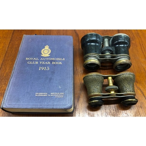 2337 - A Royal Automobile Club Year Book 1913 and 2 pairs of opera glasses, (larger pair dented to rims and... 