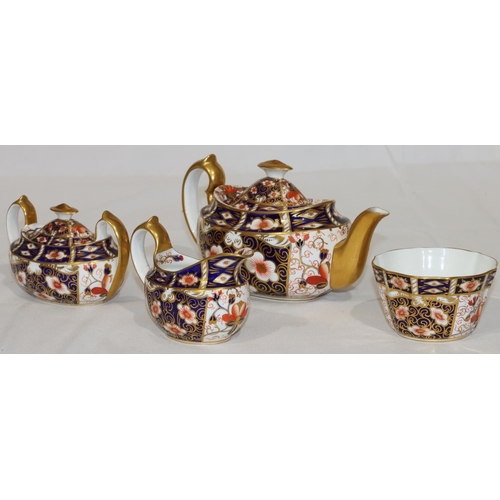 120 - A Royal Crown Derby oval 3-piece Imari pattern tea service comprising of teapot, 2-handled lidded su... 