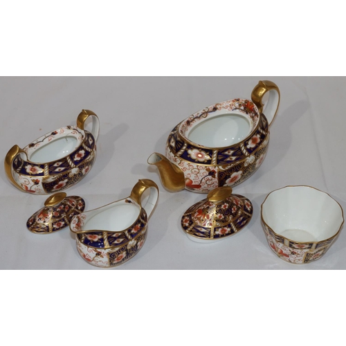 120 - A Royal Crown Derby oval 3-piece Imari pattern tea service comprising of teapot, 2-handled lidded su... 