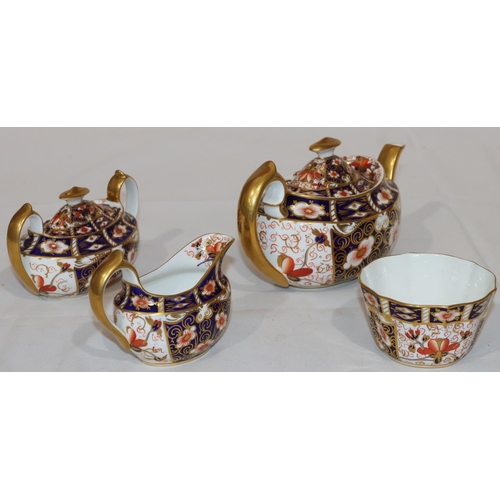 120 - A Royal Crown Derby oval 3-piece Imari pattern tea service comprising of teapot, 2-handled lidded su... 