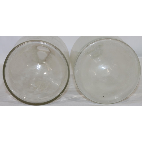 126 - A pair of plain glass round bulbous thin necked chemist's jars with stopper, 30.5cm high