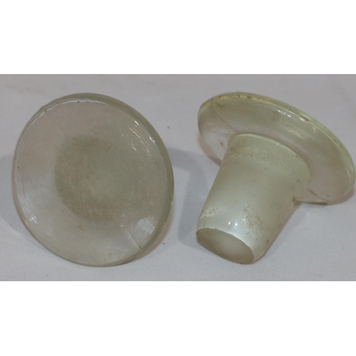 126 - A pair of plain glass round bulbous thin necked chemist's jars with stopper, 30.5cm high