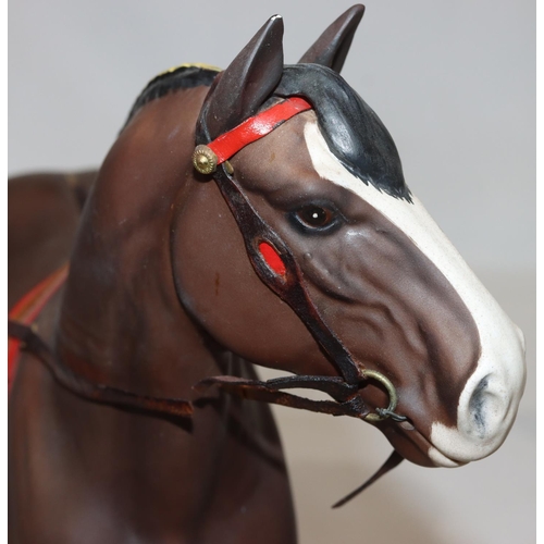 134 - A Royal Doulton figure of a rearing horse 