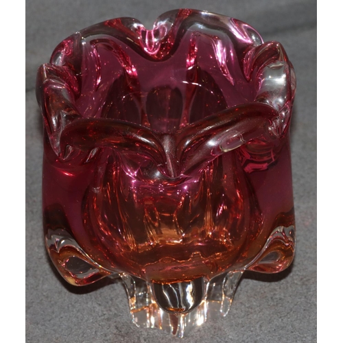 15 - A heavy ruby and yellow glass bulbous shaped vase, 18.5cm high