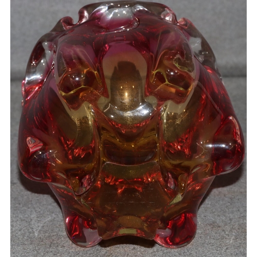 15 - A heavy ruby and yellow glass bulbous shaped vase, 18.5cm high