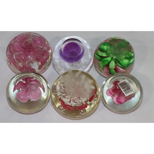 155 - Joe Rice glass round bulbous shaped paperweight with inner pink floral decoration and 5 various othe... 