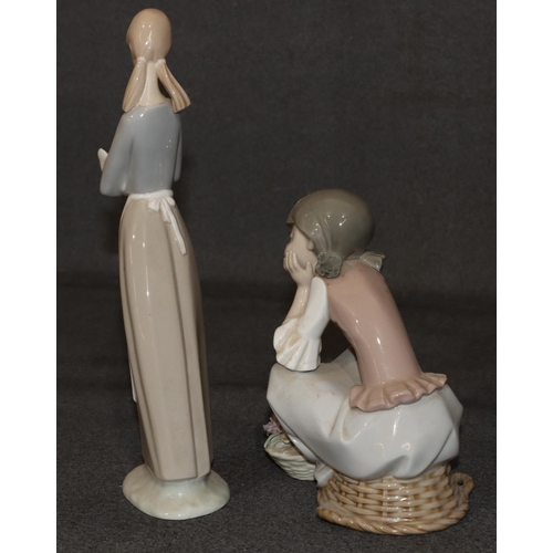 30 - A Lladro figure of a seated girl with basket of encrusted flowers, 16.5cm high and a Nao figure of a... 