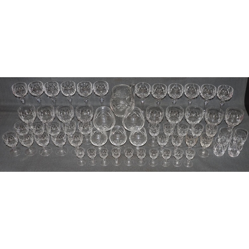 6 - A Stuart crystal cut glass service, comprising of 12 hock glasses, 9 wine glasses, 10 small glasses,... 