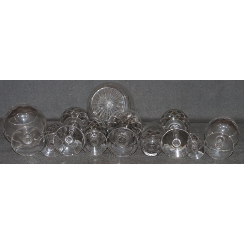 6 - A Stuart crystal cut glass service, comprising of 12 hock glasses, 9 wine glasses, 10 small glasses,... 