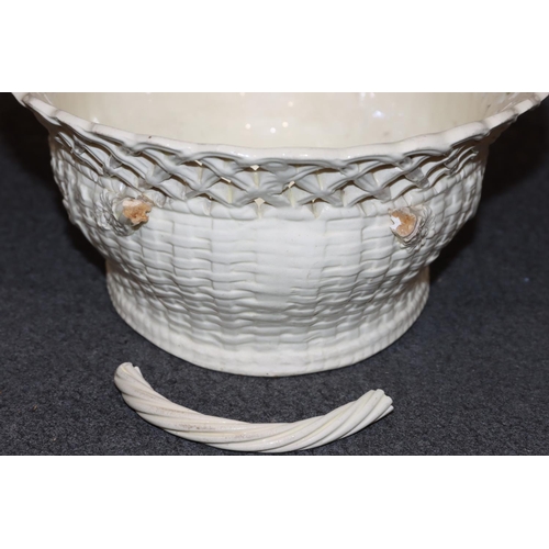 64 - A Creamware rectangular shaped 2-handled basket with pierced decoration on white and green ground wi... 