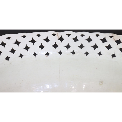 64 - A Creamware rectangular shaped 2-handled basket with pierced decoration on white and green ground wi... 