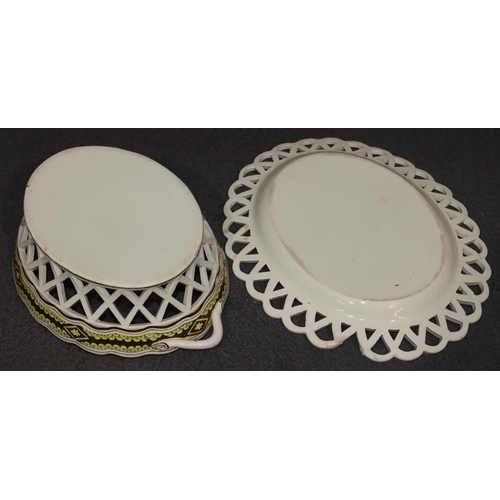 65 - An early Creamware oval 2-handled basket with scallop shaped rim with pierced gallery, brown and yel... 