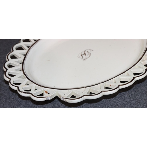 65 - An early Creamware oval 2-handled basket with scallop shaped rim with pierced gallery, brown and yel... 