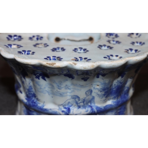 67 - A pair of Dutch blue and white bough pots with figure, floral and landscape decoration, 17cm wide