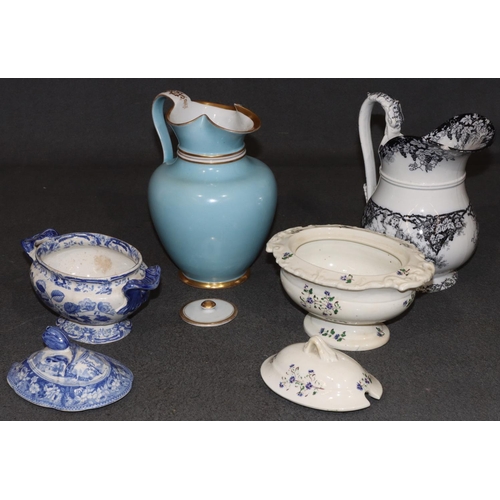 68 - A small white china oval lidded tureen with floral and leaf decoration, 19cm wide, a smaller blue an... 