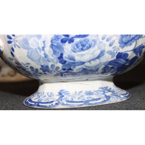 68 - A small white china oval lidded tureen with floral and leaf decoration, 19cm wide, a smaller blue an... 