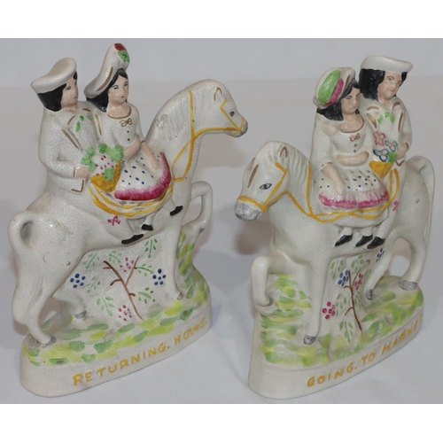 82 - A pair of reproduction Staffordshire groups, children on horseback 