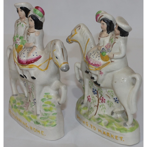 82 - A pair of reproduction Staffordshire groups, children on horseback 