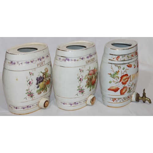 86 - 3 oval china spirit barrels with multi-coloured fruit, floral and gilt decoration 