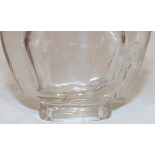 97 - A Chinese rock crystal oval lidded 2-handled pot with animal shaped handles mounted with rings, cove... 