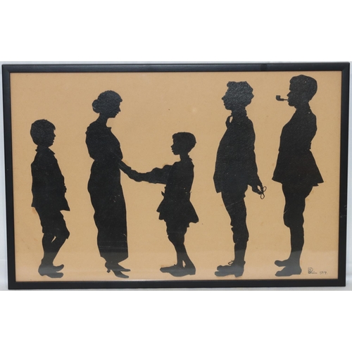 197 - An early 20th Century silhouette, 27cm x 42cm, depicting of 5 family members, signed and dated 1914,... 