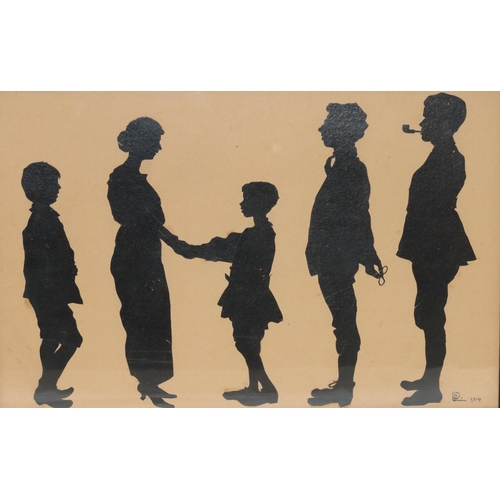 197 - An early 20th Century silhouette, 27cm x 42cm, depicting of 5 family members, signed and dated 1914,... 