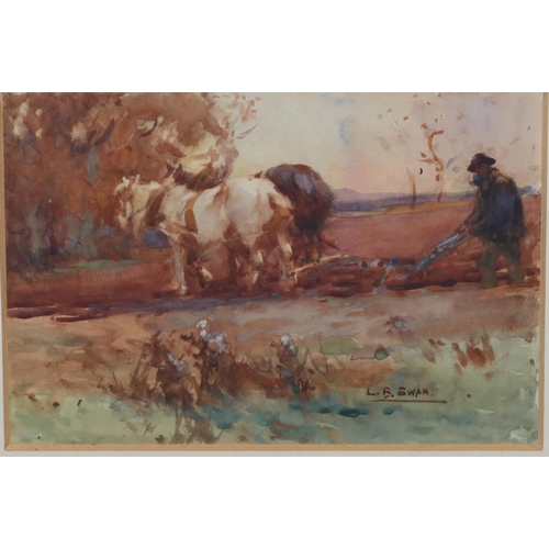 204 - L B Swan, a pair of watercolours, 17.5cm x 26cm, depicting farmers ploughing field, both signed, in ... 