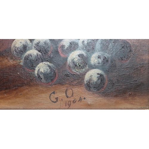 208 - An early 20th Century oil on canvas, 21cm x 31cm, still life, depicting fruit, initialled G.O. 1904,... 