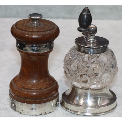 236 - A cut glass and London silver mounted round bulbous shaped pepper grinder, 9cm high and an oak and B... 