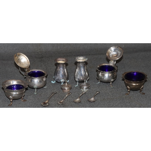 246 - A Harlequin set of 6 silver condiment set, comprising of a pair of round scallop shaped lidded musta... 